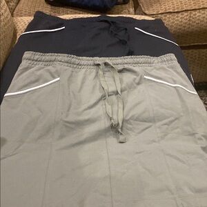 Two (2) Women Skirts - 1 Black and 1 Green